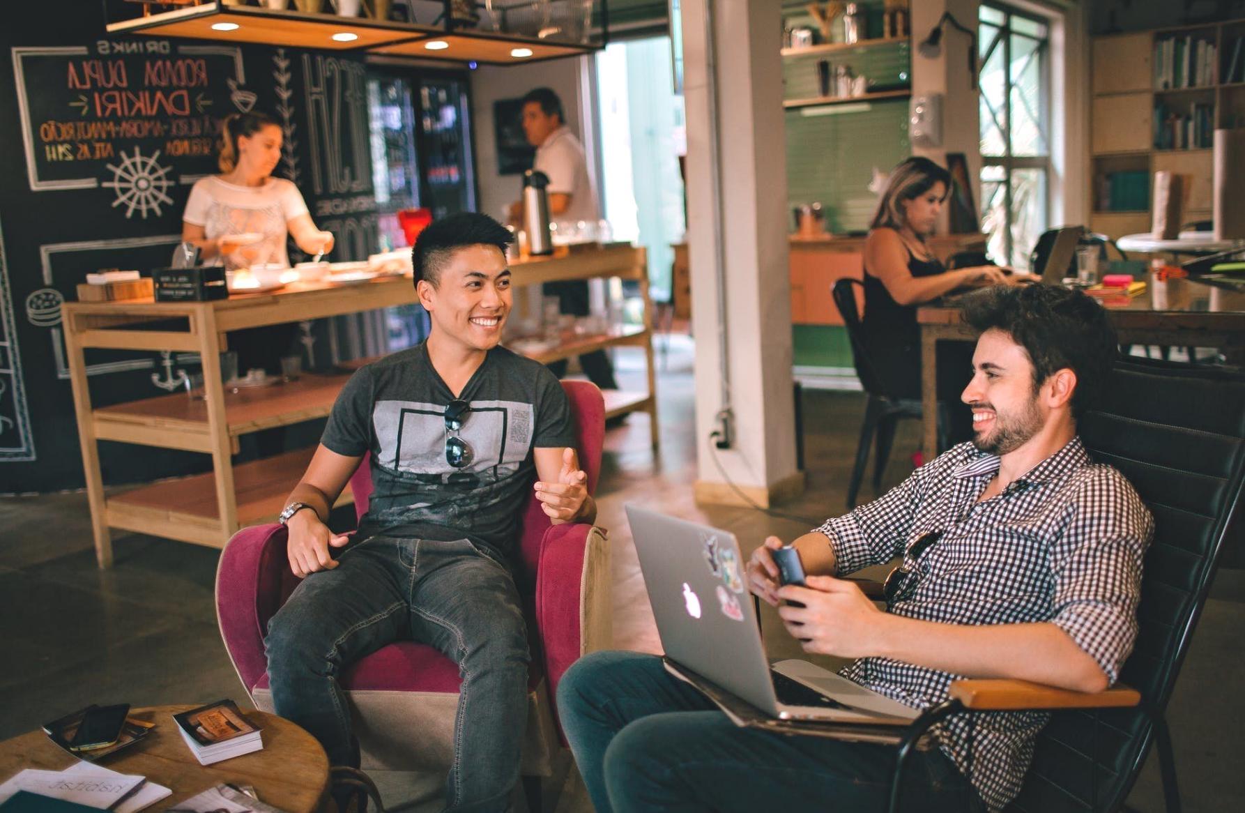 Budget planning discussion workspace with financial documents and calculator